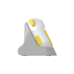 Appareil photo pour enfants myFirst Camera Insta Wi jaune, présenté de profil sur une station de charge grise
