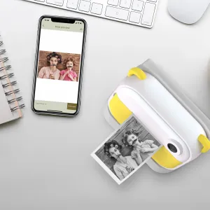 Appareil photo instantané avec imprimante myFirst Insta Wi en blanc et jaune, avec aperçu avant impression photo depuis smartphone