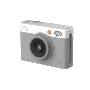 myFirst Insta Lux compact instant camera in gray and white with large lens and orange shutter button