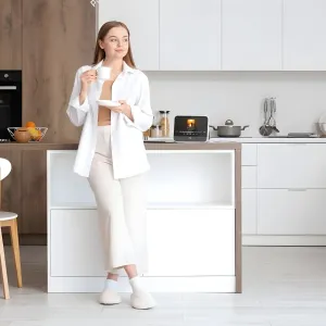 myFirst Frame Clario smart display på en köksbänk som visar albumomslag och musikuppspelning